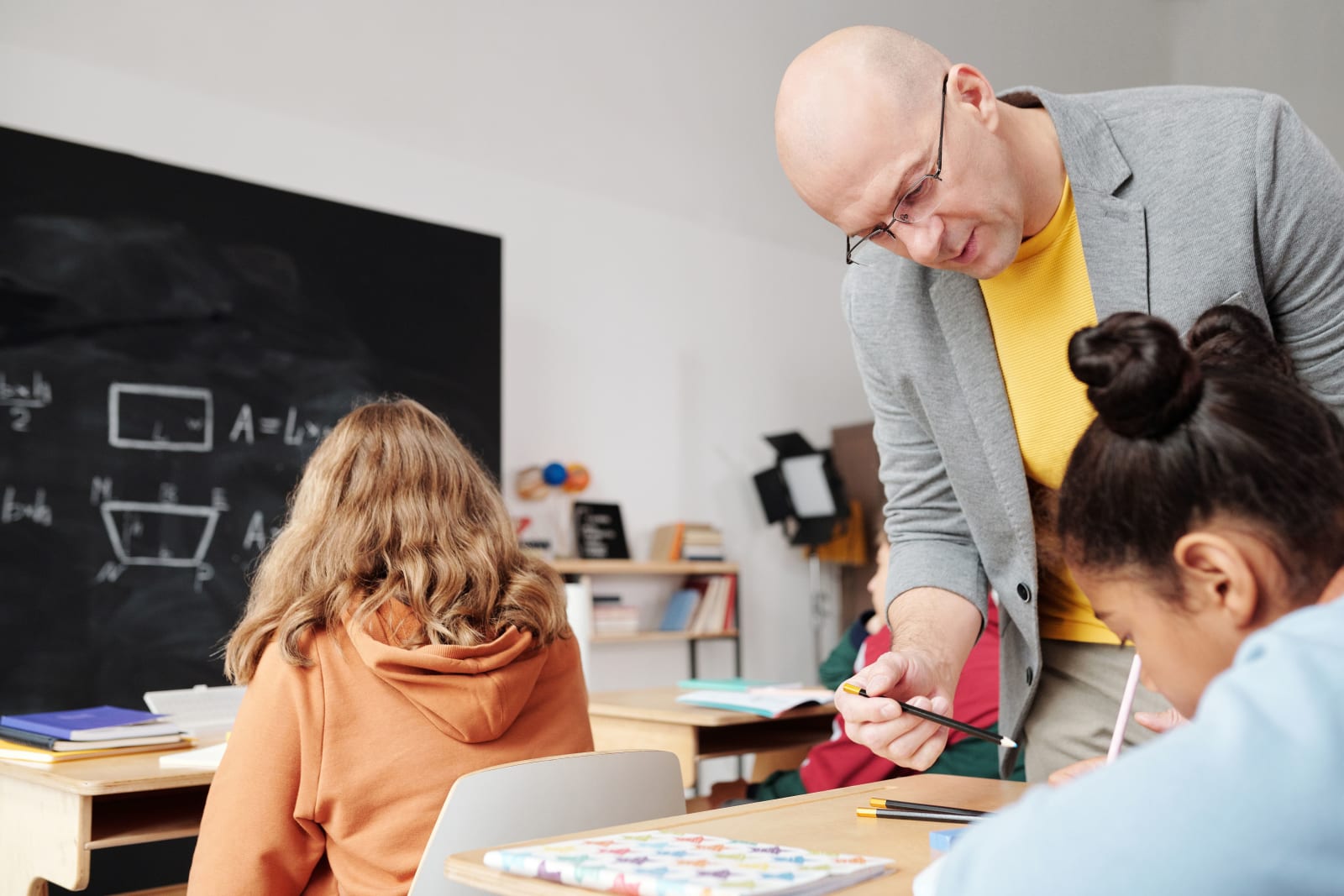 A teacher interacting with students in a classroom. (Representative Image Source: Pexels| Max Fischer)