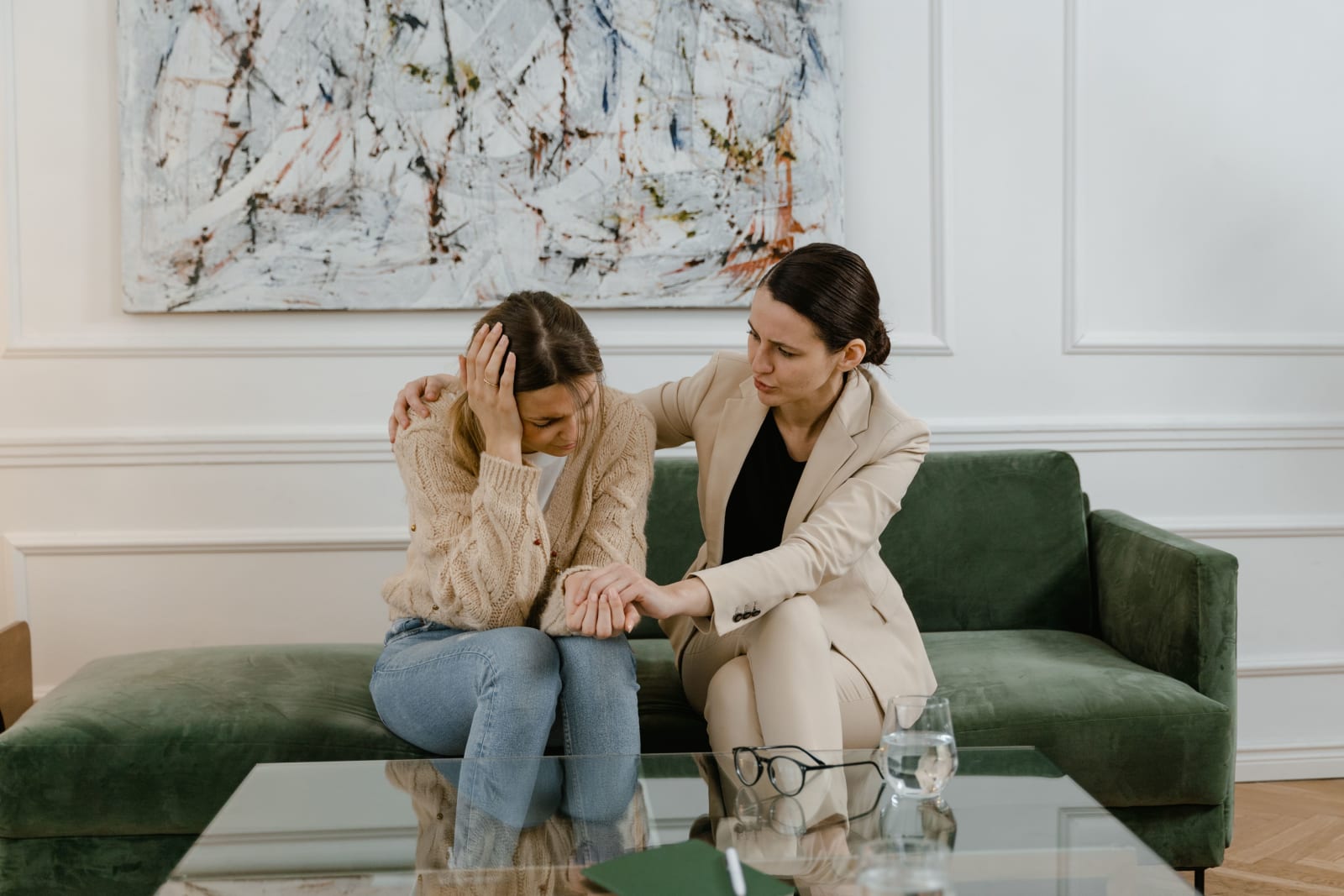 Woman supporting another woman (Representative Image Source: Pexels | MART PRODUCTION)