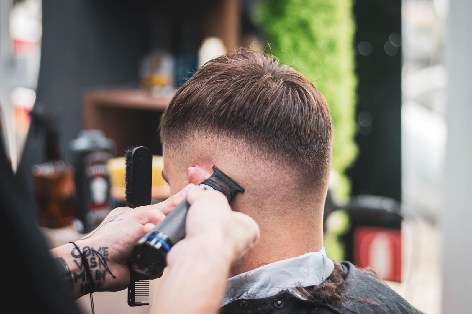 A man getting his hair cut at a salon. (Representative Image Source: Pexels| Daniel Cosma)