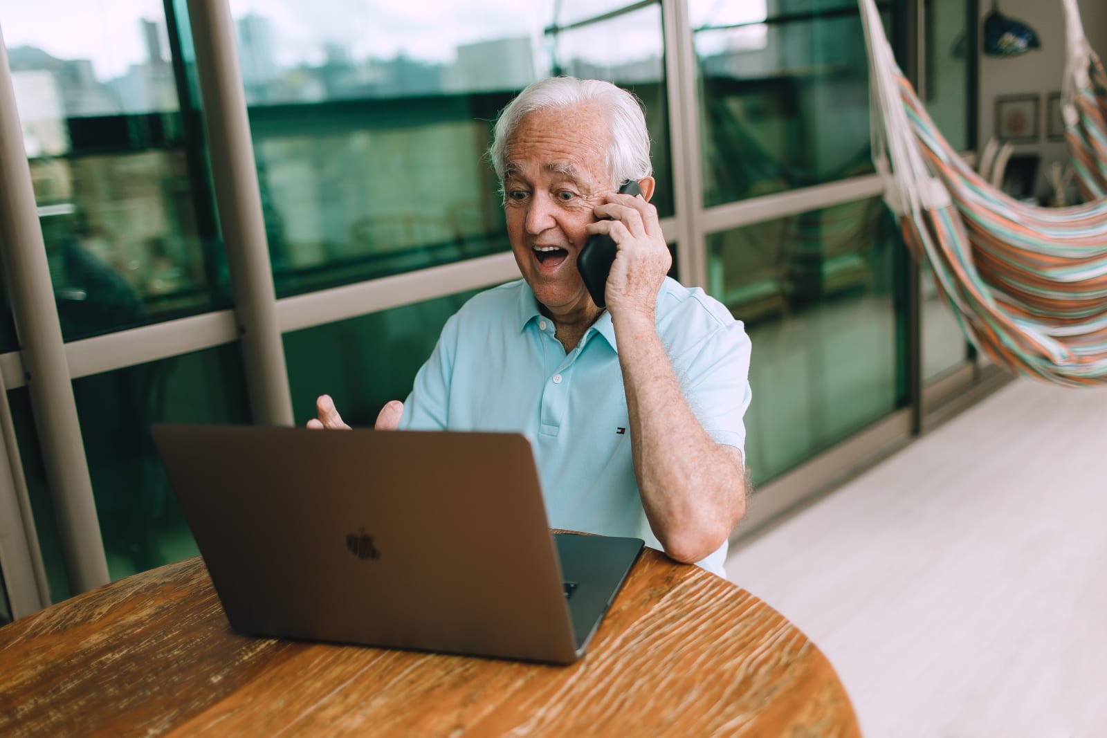 An elderly man is speaking in surprise and relief over a call. (Representative Image Source: Pexels| Helena Lopes)