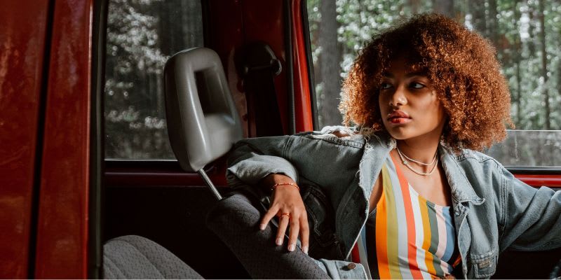 Woman in a car staring outside (Representative Image Source: Pexels, cottonbro studio)