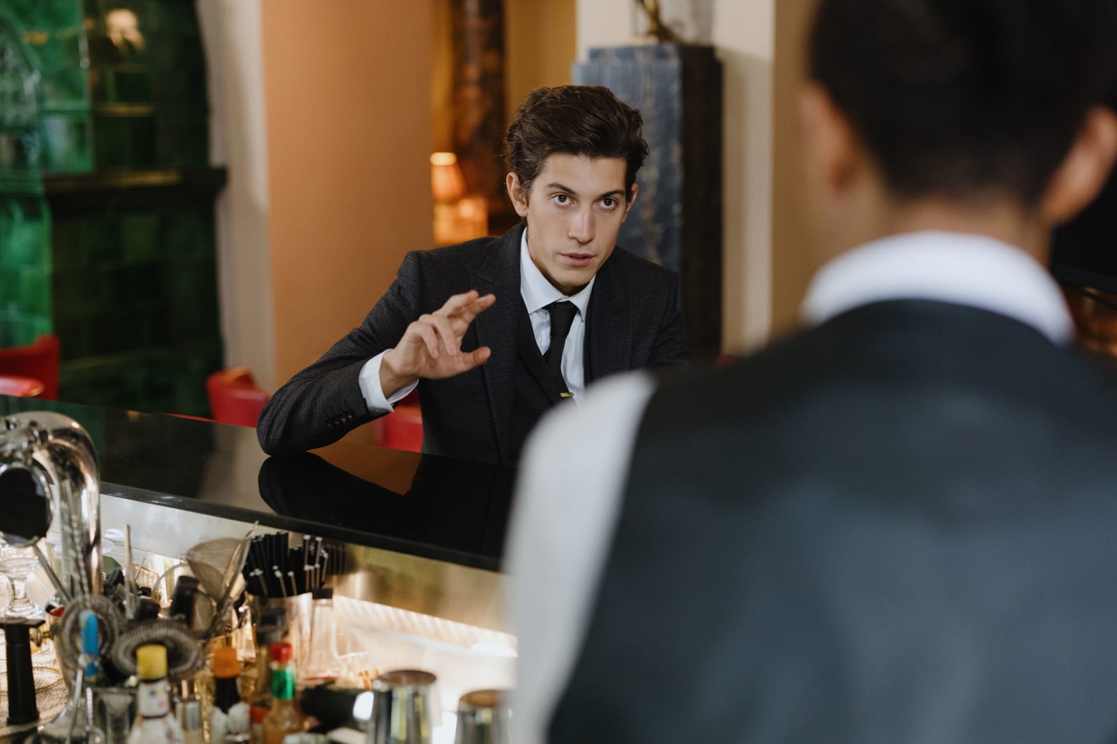 A man looks angrily while at a bar. (Representative Image Source: Pexels| cottonbro studio)