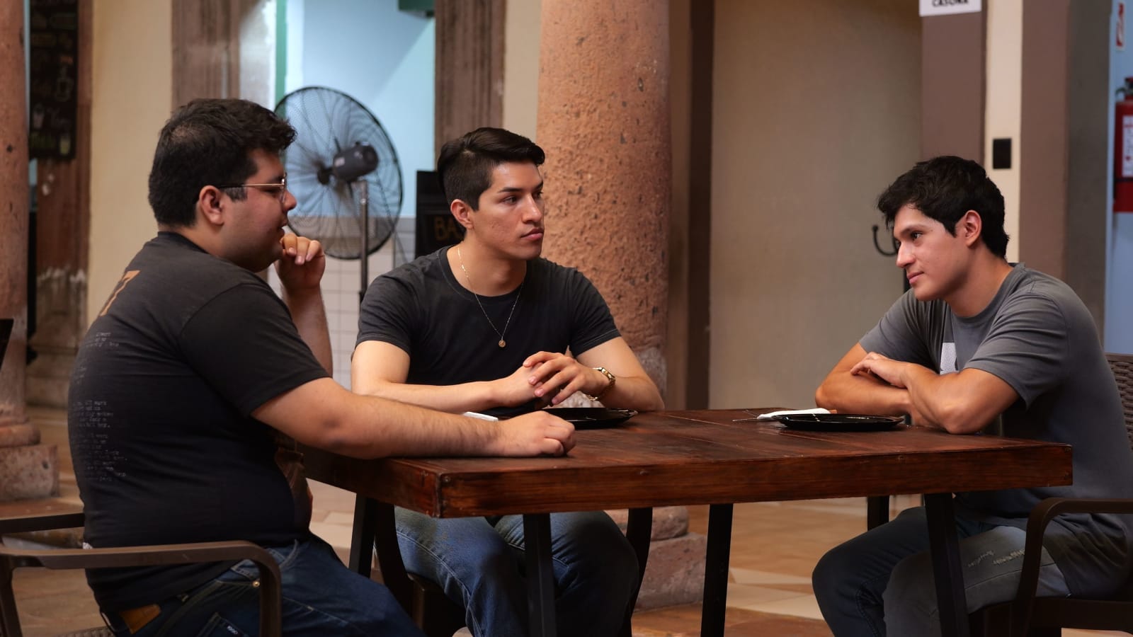 Three young men at a bar. (Representative Image Source: Pexels| Allan González)